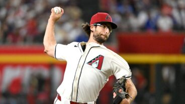 PHOENIX, ARIZONA - MARCH 27: Zac Gallen #23 of the Arizona Diamondbacks pitches in the second inning against the Chicago Cubs on Opening Day at Chase Field on March 27, 2025 in Phoenix, Arizona. (Photo by Norm Hall/Getty Images)