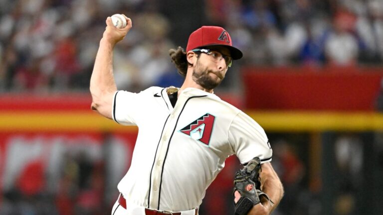 PHOENIX, ARIZONA - MARCH 27: Zac Gallen #23 of the Arizona Diamondbacks pitches in the second inning against the Chicago Cubs on Opening Day at Chase Field on March 27, 2025 in Phoenix, Arizona. (Photo by Norm Hall/Getty Images)