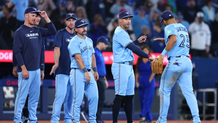 TORONTO, ON - APRIL 02: Chris Bassitt #40, Max Scherzer #31, Davis Schneider #36, George Springer #4 and Anthony Santander #25 of the Toronto Blue Jays celebrate the win following a game against the Washington Nationals at Rogers Centre on April 02, 2025 in Toronto, Ontario, Canada. (Photo by Vaughn Ridley/Getty Images)