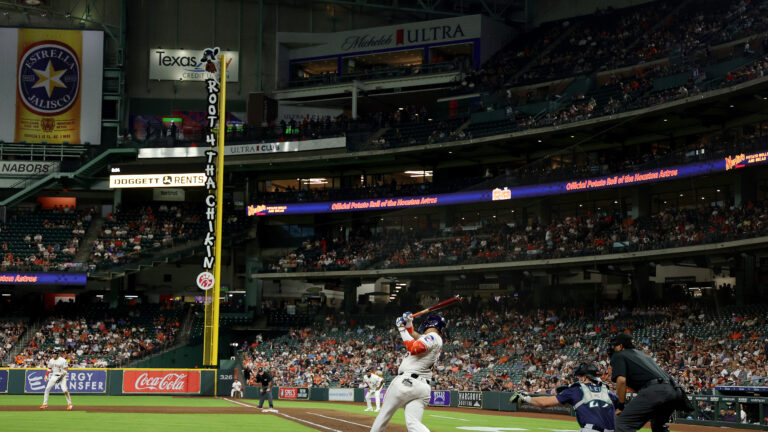 Isaac Paredes of the Houston Astros hits an RBI single in the third inning against the Seattle Mariners at Daikin Park.