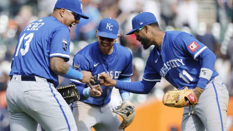 DETROIT, MI - APRIL 20: Salvador Perez #13 of the Kansas City Royals, Bobby Witt Jr. #7 and Maikel Garcia #11 celebrate after a 4-3 win over the Detroit Tigers in 10 innings at Comerica Park on April 20, 2025 in Detroit, Michigan. (Photo by Duane Burleson/Getty Images)