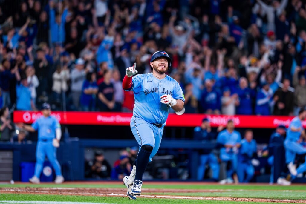 TORONTO, CANADA - APRIL 30: Alejandro Kirk #30 of the Toronto Blue Jays celebrates after hitting a walk off single against the Boston Red Sox at the Rogers Centre on Wednesday, April 30, 2025 in Toronto, Ontario, Canada. (Photo by Bailey McLean/Toronto Blue Jays/MLB Photos via Getty Images