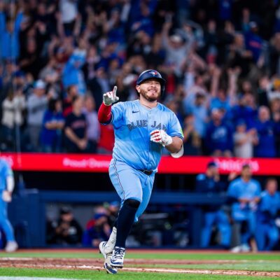 TORONTO, CANADA - APRIL 30: Alejandro Kirk #30 of the Toronto Blue Jays celebrates after hitting a walk off single against the Boston Red Sox at the Rogers Centre on Wednesday, April 30, 2025 in Toronto, Ontario, Canada. (Photo by Bailey McLean/Toronto Blue Jays/MLB Photos via Getty Images