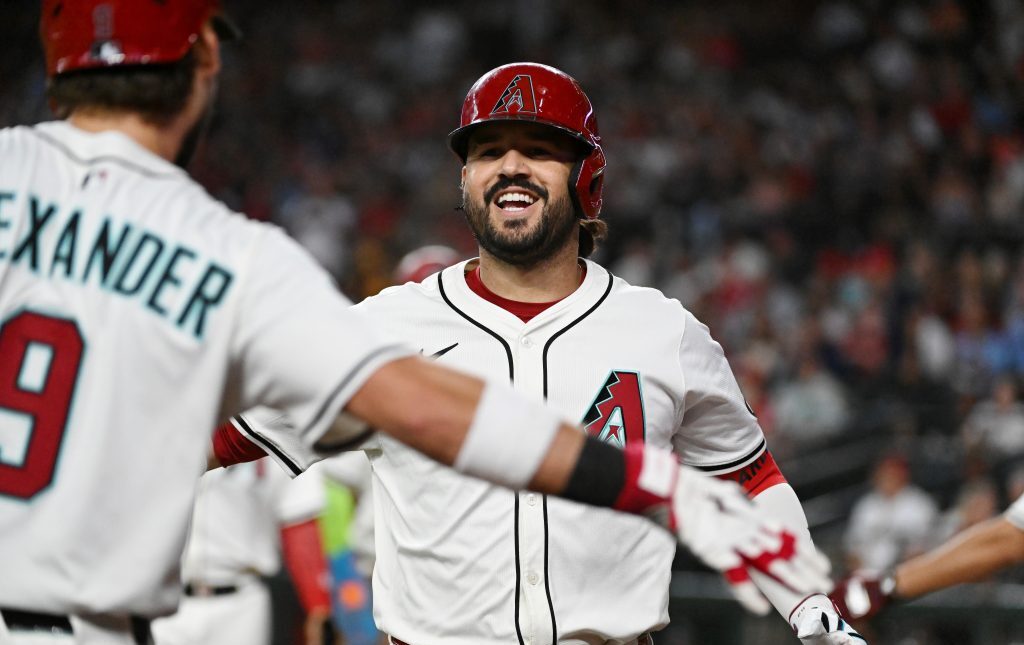 PHOENIX, ARIZONA - JULY 20: Eugenio Suarez #28 of the Arizona Diamondbacks celebrates after hitting a three run home run against the St. Louis Cardinals during the first inning at Chase Field on July 20, 2025 in Phoenix, Arizona. (Photo by Norm Hall/Getty Images)