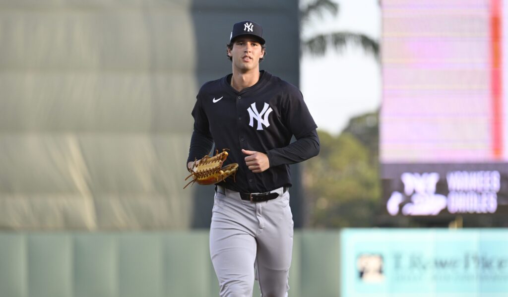 SARASOTA, FLORIDA - MARCH 15, 2025: Spencer Jones #70 of the New York Yankees jogs to the dugout during the third inning of a Spring Breakout game against the Baltimore Orioles at Ed Smith Stadium on March 15, 2025 in Sarasota, Florida. (Photo by Diamond Images via Getty Images)