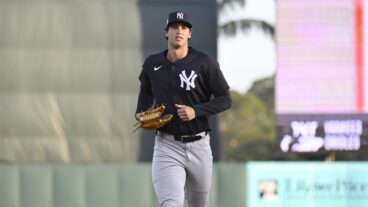 SARASOTA, FLORIDA - MARCH 15, 2025: Spencer Jones #70 of the New York Yankees jogs to the dugout during the third inning of a Spring Breakout game against the Baltimore Orioles at Ed Smith Stadium on March 15, 2025 in Sarasota, Florida. (Photo by Diamond Images via Getty Images)
