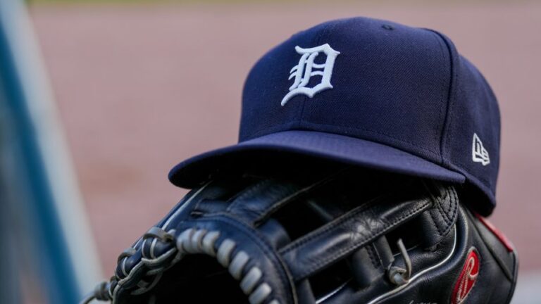 DETROIT, MICHIGAN - JUNE 25: A detail of a New Era Detroit Tigers baseball hat and Rawlings baseball glove during the game against the Athletics at Comerica Park on June 25, 2025 in Detroit, Michigan. (Photo by Nic Antaya/Getty Images)
