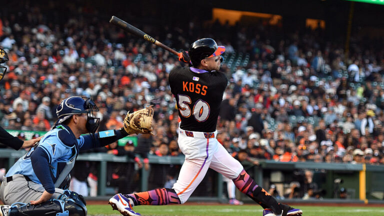 SAN FRANCISCO, CALIFORNIA - AUGUST 16: Christian Koss #50 of the San Francisco Giants hits a double against the Tampa Bay Rays in the second inning at Oracle Park on August 16, 2025 in San Francisco, California. (Photo by Brandon Vallance/Getty Images)