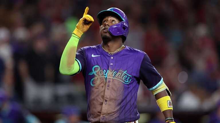 PHOENIX, ARIZONA - AUGUST 23: Geraldo Perdomo #2 of the Arizona Diamondbacks reacts while crossing home plate after hitting a two run home run against the Cincinnati Reds during the fourth inning at Chase Field on August 23, 2025 in Phoenix, Arizona. (Photo by Chris Coduto/Getty Images)