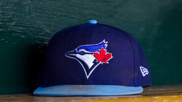 DETROIT, MICHIGAN - JULY 24: A detail of the Toronto Blue Jays logo on a hat during the game against the Detroit Tigers at Comerica Park on July 24, 2025 in Detroit, Michigan. (Photo by Nic Antaya/Getty Images)