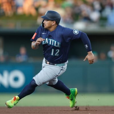SACRAMENTO, CALIFORNIA - JULY 28: Josh Naylor #12 of the Seattle Mariners steals second base in the top of the fourth inning against the Athletics at Sutter Health Park on July 28, 2025 in Sacramento, California. (Photo by Lachlan Cunningham/Getty Images)