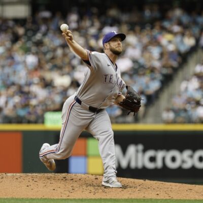 SEATTLE, WASHINGTON - AUGUST 02: Merrill Kelly #23 of the Texas Rangers throws a pitch during the third inning against the Seattle Mariners at T-Mobile Park on August 02, 2025 in Seattle, Washington. (Photo by Alika Jenner/Getty Images)