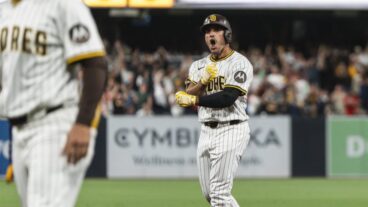 SAN DIEGO, CALIFORNIA - AUGUST 9: Ramón Laureano #5 of the San Diego Padres celebrates after hitting the walk-off single in the tenth inning during the game against the Boston Red Sox at Petco Park on August 9, 2025 in San Diego, California. (Photo by Matt Thomas/San Diego Padres/Getty Images)