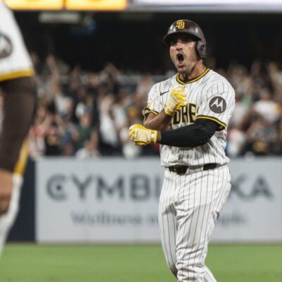 SAN DIEGO, CALIFORNIA - AUGUST 9: Ramón Laureano #5 of the San Diego Padres celebrates after hitting the walk-off single in the tenth inning during the game against the Boston Red Sox at Petco Park on August 9, 2025 in San Diego, California. (Photo by Matt Thomas/San Diego Padres/Getty Images)