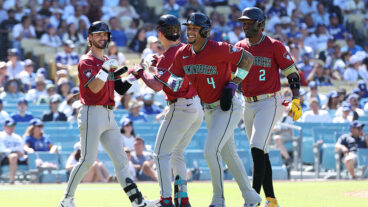 LOS ANGELES, CALIFORNIA - AUGUST 31: Corbin Carroll #7, Ketel Marte #4 and Geraldo Perdomo #2 of the Arizona Diamondbacks celebrate Corbin Carroll's three run home run in the eighth inning at Dodger Stadium on August 31, 2025 in Los Angeles, California. (Photo by Joe Scarnici/Getty Images)