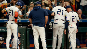 HOUSTON, TEXAS - SEPTEMBER 15: Yordan Alvarez #44 of the Houston Astros is helped off the field turning his ankle at home plate in the first inning against the Texas Rangers at Daikin Park on September 15, 2025 in Houston, Texas. (Photo by Kenneth Richmond/Getty Images)