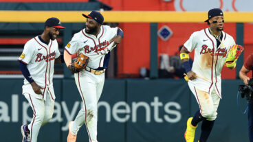 ATLANTA, GA - AUGUST 19: Atlanta Braves left fielder Jurickson Profar (l), center fielder Michael Harris II #23 and right fielder Ronald Acuna, Jr. (r) come in after the Braves win the Tuesday evening MLB game between the Chicago White Sox and the Atlanta Braves on August 19, 2025 at Truist Park in Atlanta, Georgia. (Photo by David J. Griffin/Icon Sportswire via Getty Images)