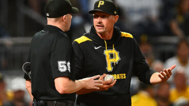 PITTSBURGH, PENNSYLVANIA - SEPTEMBER 2: Manager Don Kelly #12 of the Pittsburgh Pirates argues a call with umpire Nic Lentz #59 during the seventh inning against the Los Angeles Dodgers at PNC Park on September 2, 2025 in Pittsburgh, Pennsylvania. (Photo by Joe Sargent/Getty Images)