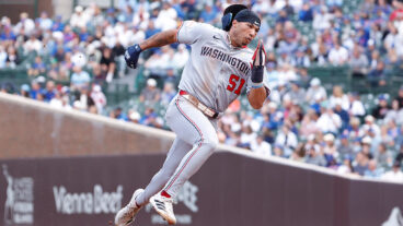CHICAGO, ILLINOIS - SEPTEMBER 07: Daylen Lile #51 of the Washington Nationals runs towards third during the fifth inning against the Chicago Cubs at Wrigley Field on September 07, 2025 in Chicago, Illinois. (Photo by Sage Zipeto/Getty Images)