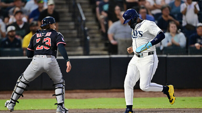 TAMPA, FLORIDA - SEPTEMBER 04: Junior Caminero #13 of the Tampa Bay Rays scores on an RBI single off the bat of Christopher Morel (not pictured) in the first inning against the Cleveland Guardians at George M. Steinbrenner Field on September 04, 2025 in Tampa, Florida. (Photo by Julio Aguilar/Getty Images)