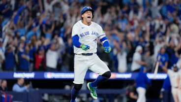 TORONTO, ONTARIO - OCTOBER 20: George Springer #4 of the Toronto Blue Jays celebrates after hitting a three-run home run against the Seattle Mariners during the seventh inning in game seven of the American League Championship Series at the Rogers Centre on October 20, 2025 in Toronto, Ontario. (Photo by Mark Blinch/Getty Images)