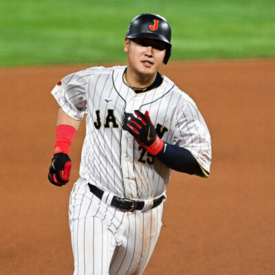 MIAMI, FLORIDA - MARCH 21: Kazuma Okamoto #25 of Team Japan hits a solo homerun in the bottom of the fourth inning during World Baseball Classic Championship between United States and Japan at loanDepot park on March 21, 2023 in Miami, Florida. (Photo by Gene Wang/Getty Images)