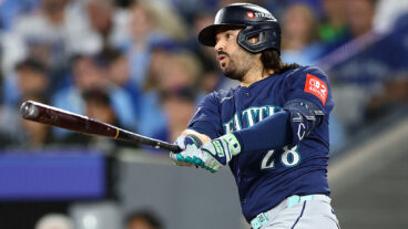 TORONTO, ONTARIO - OCTOBER 20: Eugenio Suarez #28 of the Seattle Mariners hits a single during the second inning against the Toronto Blue Jays in game seven of the American League Championship Series at the Rogers Centre on October 20, 2025 in Toronto, Ontario. (Photo by Vaughn Ridley/Getty Images)