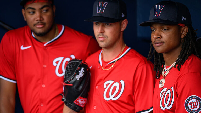 PALM BEACH, FL - FEBRUARY 23: Left to right, James Wood, MacKenzie Gore, and CJ Abrams the dugout before a Spring Training game between the Washington Nationals and the New York Mets at CACTI Park of the Palm Beaches on February 23, 2025. (Photo by Thomas Simonetti for The Washington Post via Getty Images)