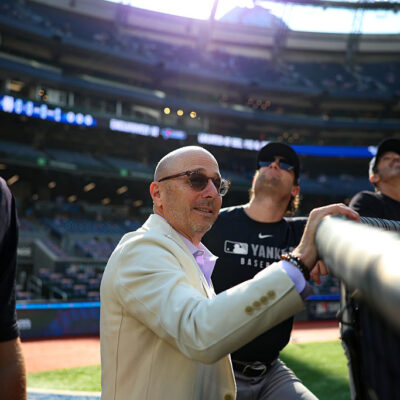 TORONTO, CANADA - OCTOBER 04: General Manager Brian Cashman of the New York Yankees looks on during batting practice before the game against the Toronto Blue Jays at Rogers Centre on October 4, 2025 in Toronto, Canada. (Photo by New York Yankees/Getty Images)