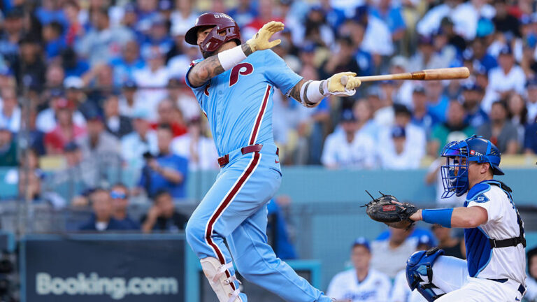 LOS ANGELES, CA - OCTOBER 09: Nick Castellanos #8 of the Philadelphia Phillies hits a RBI double in the seventh inning during Game Four of the National League Division Series presented by Booking.com between the Philadelphia Phillies and the Los Angeles Dodgers at Dodger Stadium on Thursday, October 9, 2025 in Los Angeles, California. (Photo by Nicole Vasquez/MLB Photos via Getty Images)