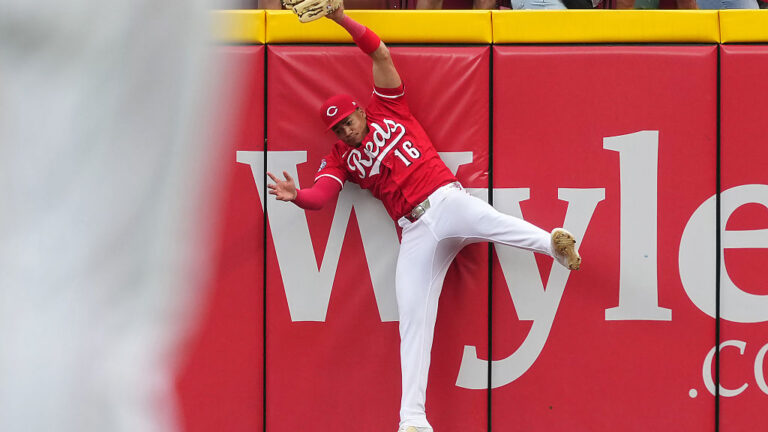 CINCINNATI, OHIO - SEPTEMBER 25: Noelvi Marte #16 of the Cincinnati Reds leaps to make a catch in the ninth inning against the Pittsburgh Pirates at Great American Ball Park on September 25, 2025 in Cincinnati, Ohio. (Photo by Dylan Buell/Getty Images)