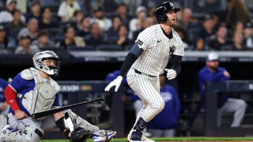 NEW YORK, NEW YORK - OCTOBER 08: Ryan McMahon #19 of the New York Yankees hits a solo home run against the Toronto Blue Jays during the third inning in game four of the American League Division Series at Yankee Stadium on October 08, 2025 in New York City. (Photo by Al Bello/Getty Images)