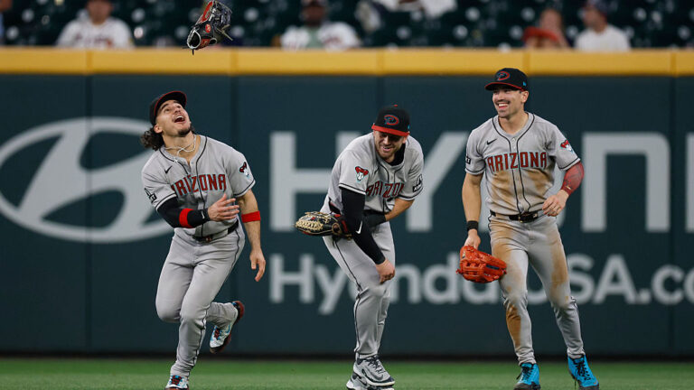 ATLANTA, GEORGIA - JUNE 3: (L-R) Alek Thomas #5, Tim Tawa #13, and Corbin Carroll #7 of the Arizona Diamondbacks celebrate after a team victory over the Atlanta Braves at Truist Park on June 3, 2025 in Atlanta, Georgia. (Photo by Brandon Sloter/Getty Images)