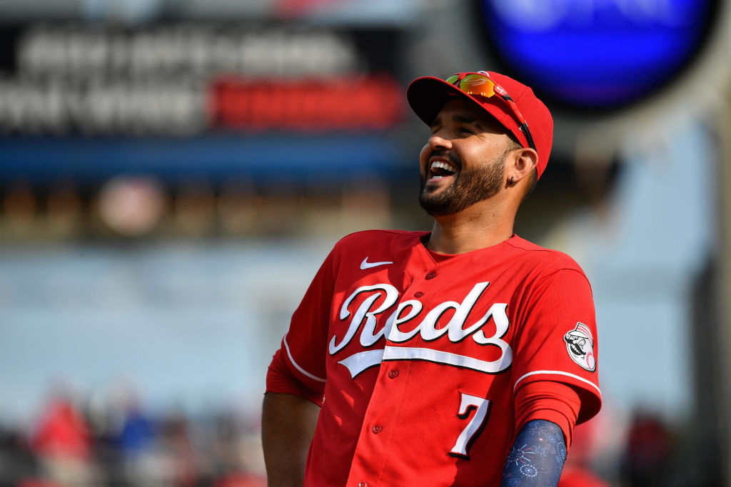 CINCINNATI, OH - JULY 3: Eugenio Suárez #7 of the Cincinnati Reds is amused by a fan during a game against the Chicago Cubs at Great American Ball Park on July 3, 2021 in Cincinnati, Ohio. (Photo by Jamie Sabau/Getty Images)