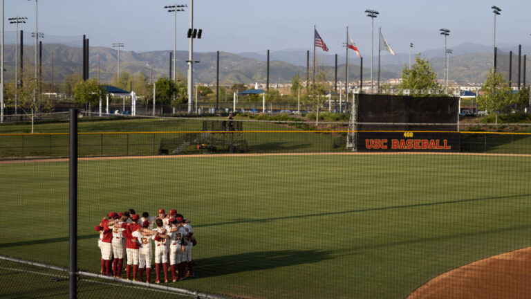 Irvine, CA - May 03: USC baseball players huddle together before a game with Cal at the Great Park in Irvine Friday, May 3, 2024. (Allen J. Schaben / Los Angeles Times via Getty Images)