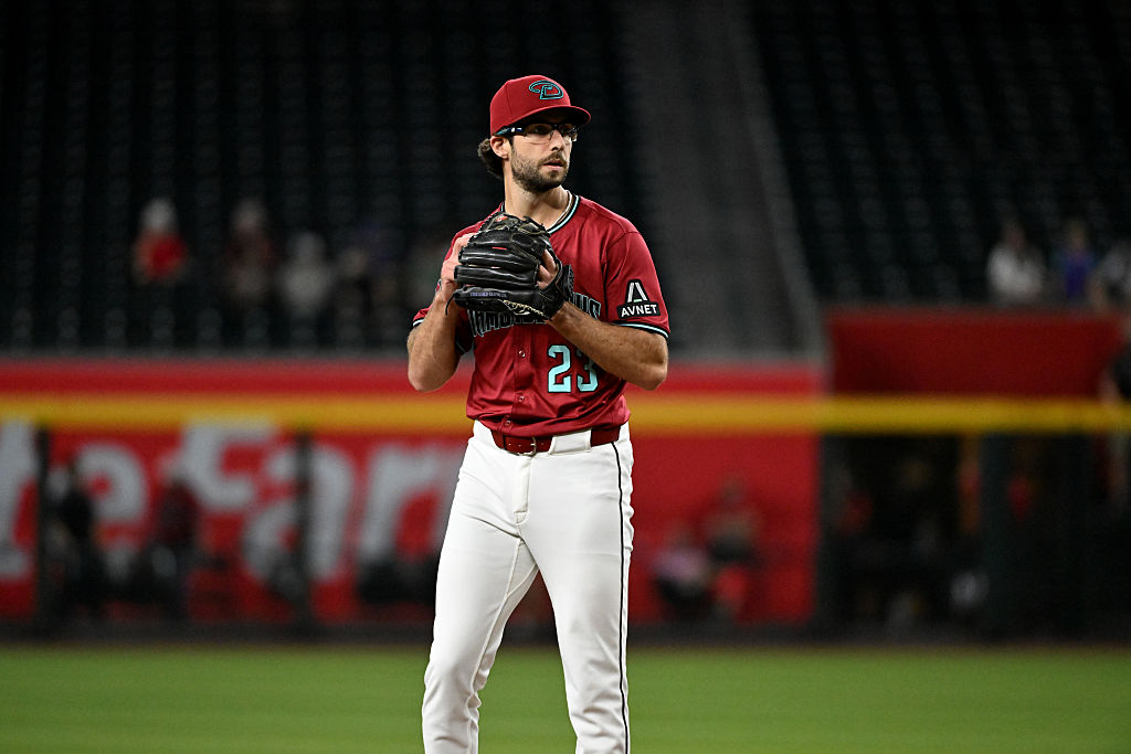 PHOENIX, ARIZONA - SEPTEMBER 03: Zac Gallen #23 of the Arizona Diamondbacks delivers a pitch against the Texas Rangers at Chase Field on September 03, 2025 in Phoenix, Arizona. (Photo by Norm Hall/Getty Images)