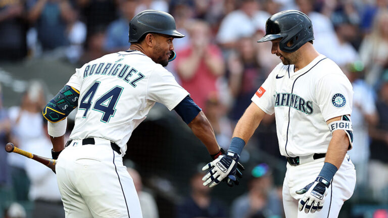 SEATTLE, WASHINGTON - AUGUST 25: Cal Raleigh #29 of the Seattle Mariners celebrates after his solo home run, his 50th of the regular season, with Julio Rodríguez #44 against the San Diego Padres during the first inning at T-Mobile Park on August 25, 2025 in Seattle, Washington. (Photo by Steph Chambers/Getty Images)