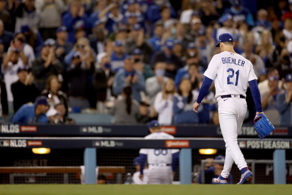 Walker Buehler #21 of the Los Angeles Dodgers leaves the game against the San Francisco Giants during the fifth inning in game 4 of the National League Division Series at Dodger Stadium.