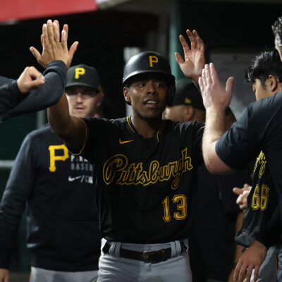 Ke'Bryan Hayes of the Pittsburgh Pirates celebrates after scoring in the 5th inning against the Cincinnati Reds at Great American Ball Park.