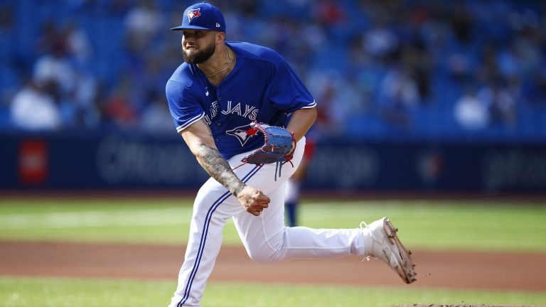 Alek Manoah of the Toronto Blue Jays delivers a pitch in the first inning during a MLB game against the Baltimore Orioles at Rogers Centre.