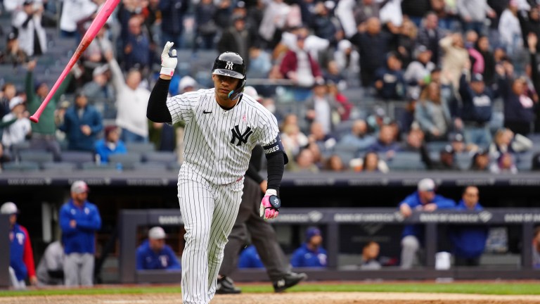 Gleyber Torres #25 of the New York Yankees celebrates after hitting a walk off home run to defeat the Texas Rangers at Yankee Stadium.