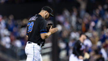 Tylor Megill of the New York Mets reacts at the third inning of the game against the Philadelphia Phillies at Citi Field.