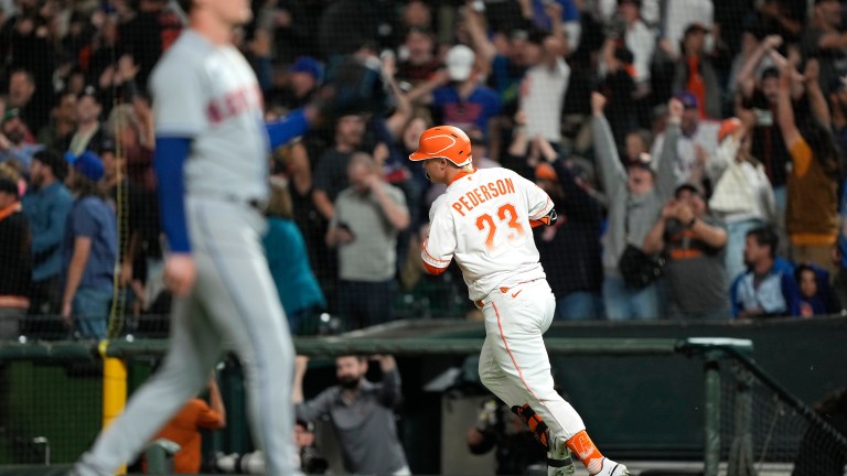 Joc Pederson of the San Francisco Giants trots around the bases after hitting a three-run home run. Could Joc Pederson return to his former team in free agency?