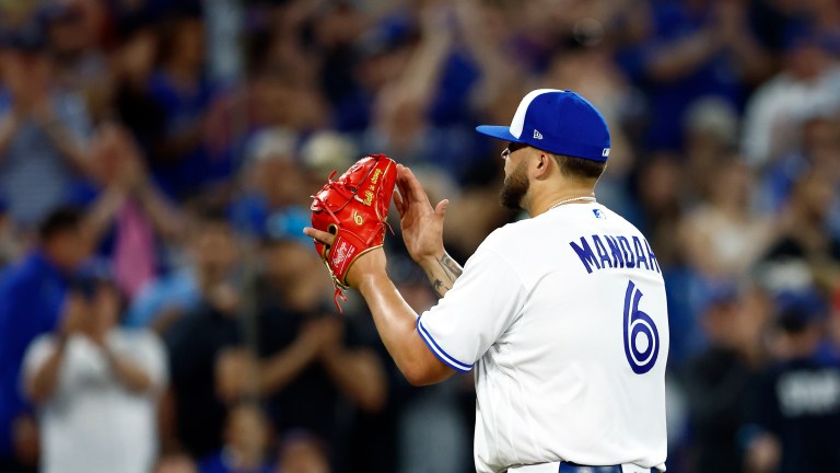 Alek Manoah of the Toronto Blue Jays leaves the game in the eighth inning during a MLB game against the Chicago White Sox at Rogers Centre.