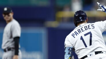 Isaac Paredes of the Tampa Bay Rays rounds the bases after hitting a solo home run during the first inning against the New York Yankees at Tropicana Field.