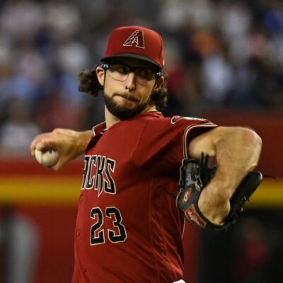 PHOENIX, ARIZONA - SEPTEMBER 04: Zac Gallen #23 of the Arizona Diamondbacks delivers a pitch against the Milwaukee Brewers at Chase Field on September 04, 2022 in Phoenix, Arizona. (Photo by Norm Hall/Getty Images)