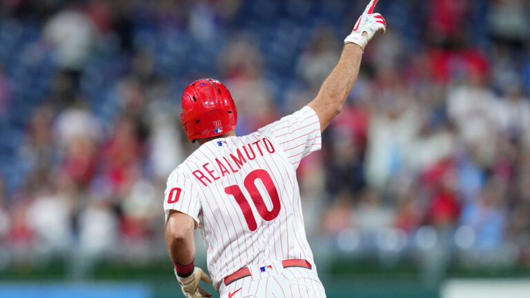 PHILADELPHIA, PA - SEPTEMBER 09: J.T. Realmuto #10 of the Philadelphia Phillies reacts after hitting a solo home run in the bottom of the sixth inning against the Washington Nationals at Citizens Bank Park on September 9, 2022 in Philadelphia, Pennsylvania. The Phillies defeated the Nationals 5-3. (Photo by Mitchell Leff/Getty Images)