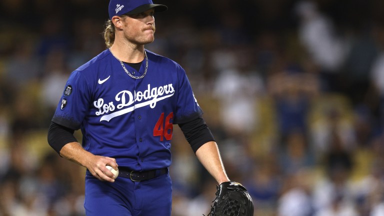 Craig Kimbrel of the Los Angeles Dodgers reacts to a Christian Walker #53 of the Arizona Diamondbacks solo homerun, to take a 2-1 lead, during the ninth inning at Dodger Stadium.