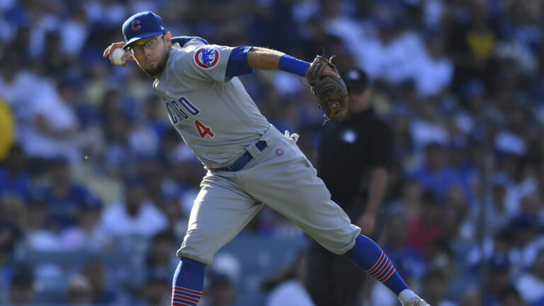 LOS ANGELES, CA - JUNE 27: Eric Sogard (4) of the Chicago Cubs makes a throw to first base while playing the Los Angeles Dodgers on June 27, 2021 at Dodger Stadium in Los Angeles, CA.(Photo by John McCoy/Icon Sportswire via Getty Images)
