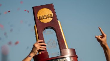 OMAHA, NE - June 26: The National Championship trophy is lifted by the Ole Miss Rebels after winning the Men's College World Series game at Charles Schwab Field on June 26, 2022 in Omaha, Nebraska. Ole Miss defeated Oklahoma in the second game of the championship series to win the National Championship. (Photo by Eric Francis/Getty Images)
